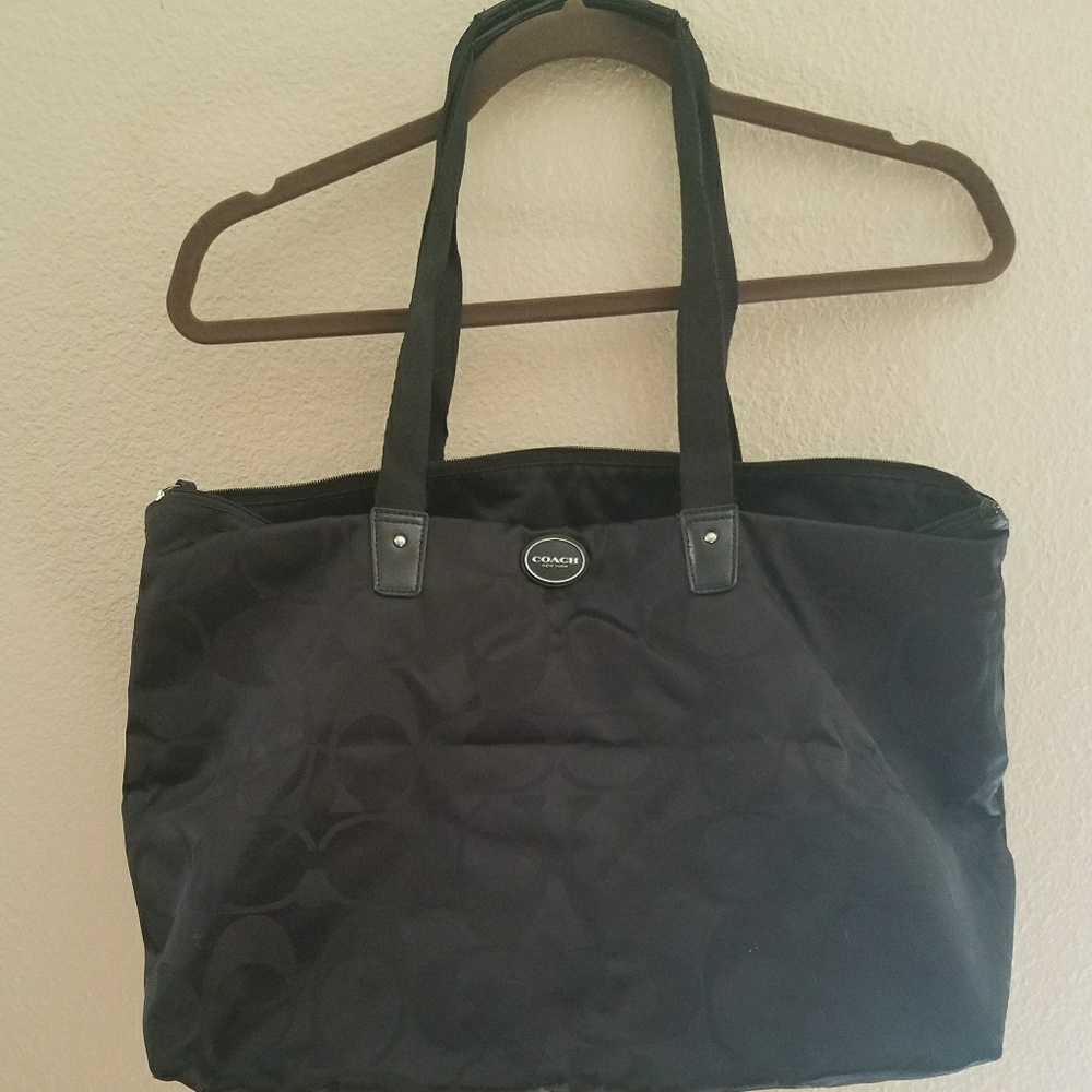 Signature Coach Weekender tote bag